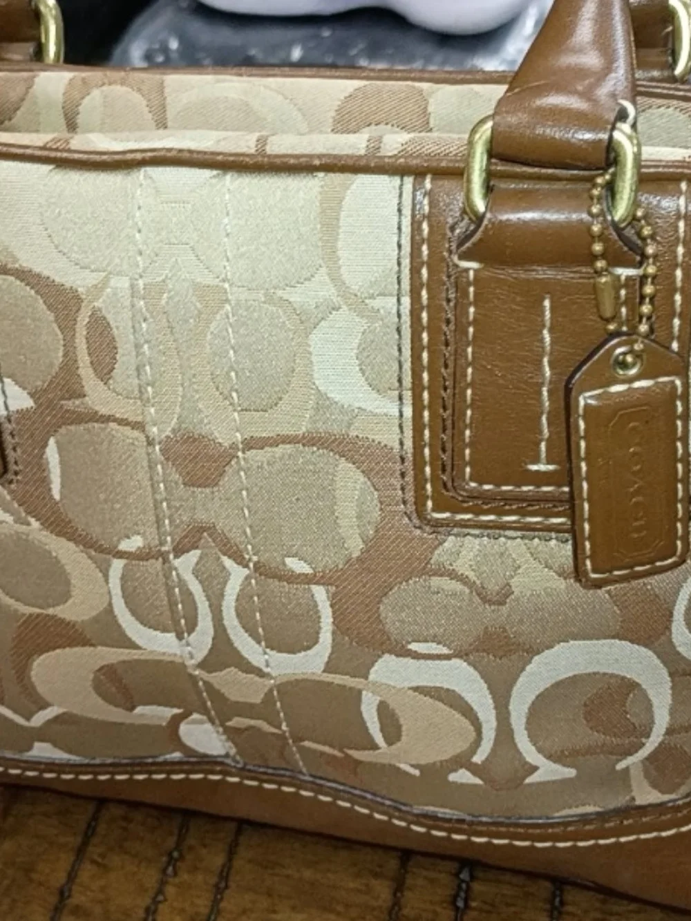 Coach authentic stitched detail